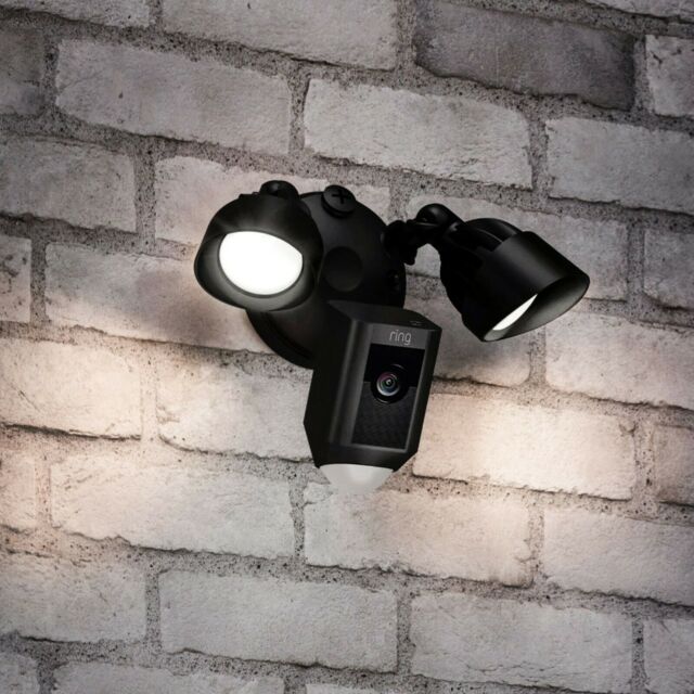 lit black floodlight cam